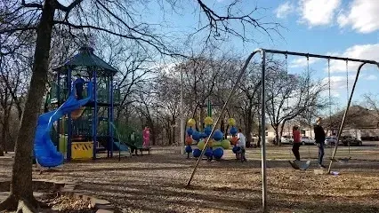 Burleson Electrician
- Playground scene with children on a blue slide and swings. A colorful climbing structure sits nearby.