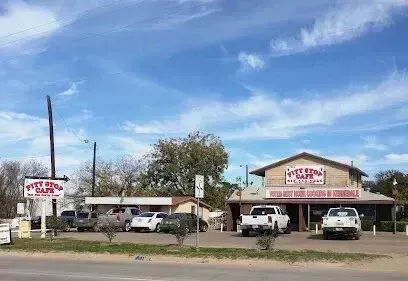 Burleson Electrician - A roadside café with a large sign reading 