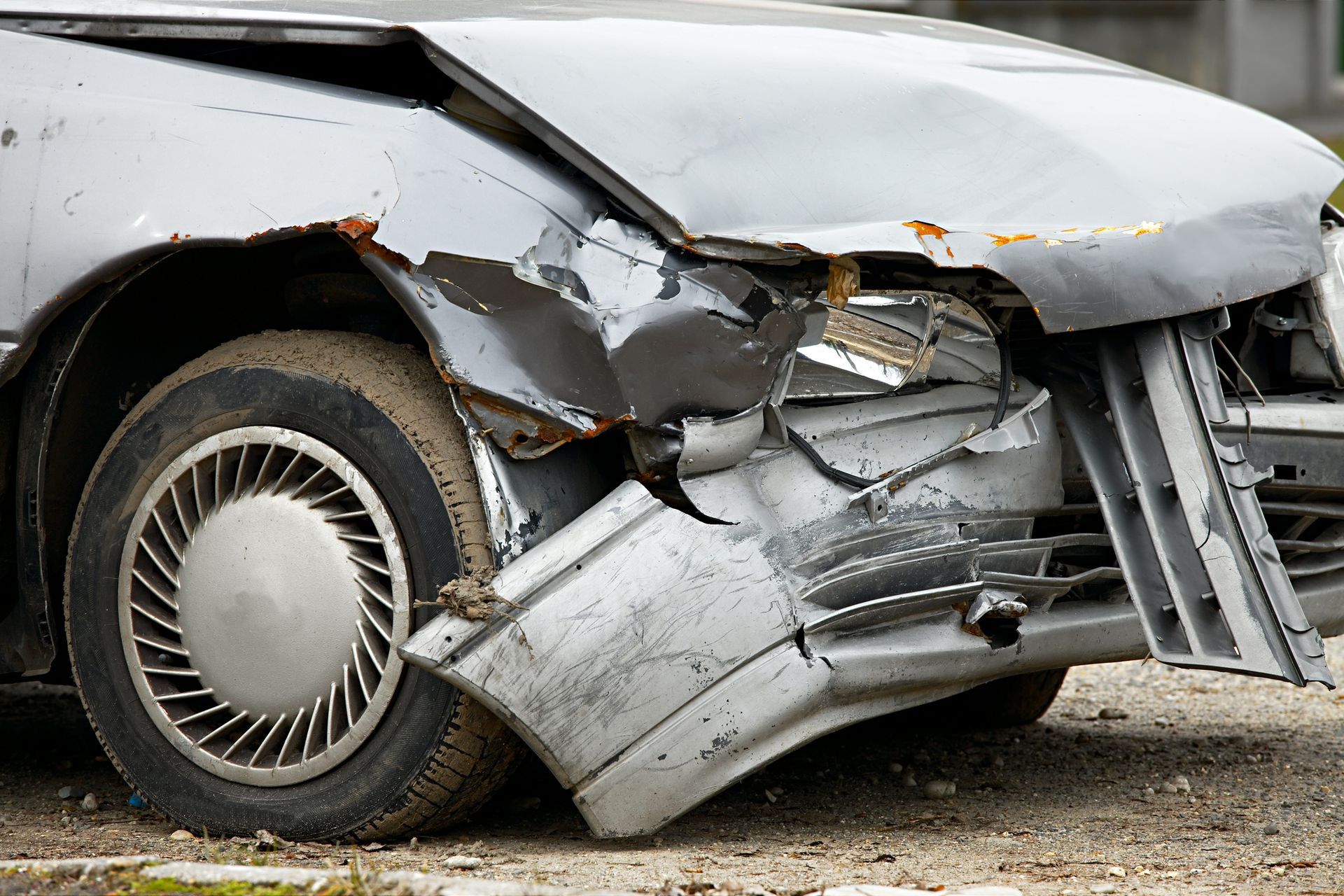 Damaged car bumper, showcasing professional commercial fleet repair for efficient fleet recovery.