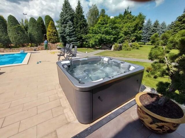 A premium hot tub in the garden from hypa spa
