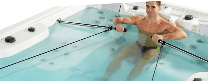 a man rowing in a swim spa from hypa spa