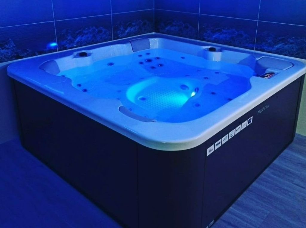A hypa spa hot tub at night