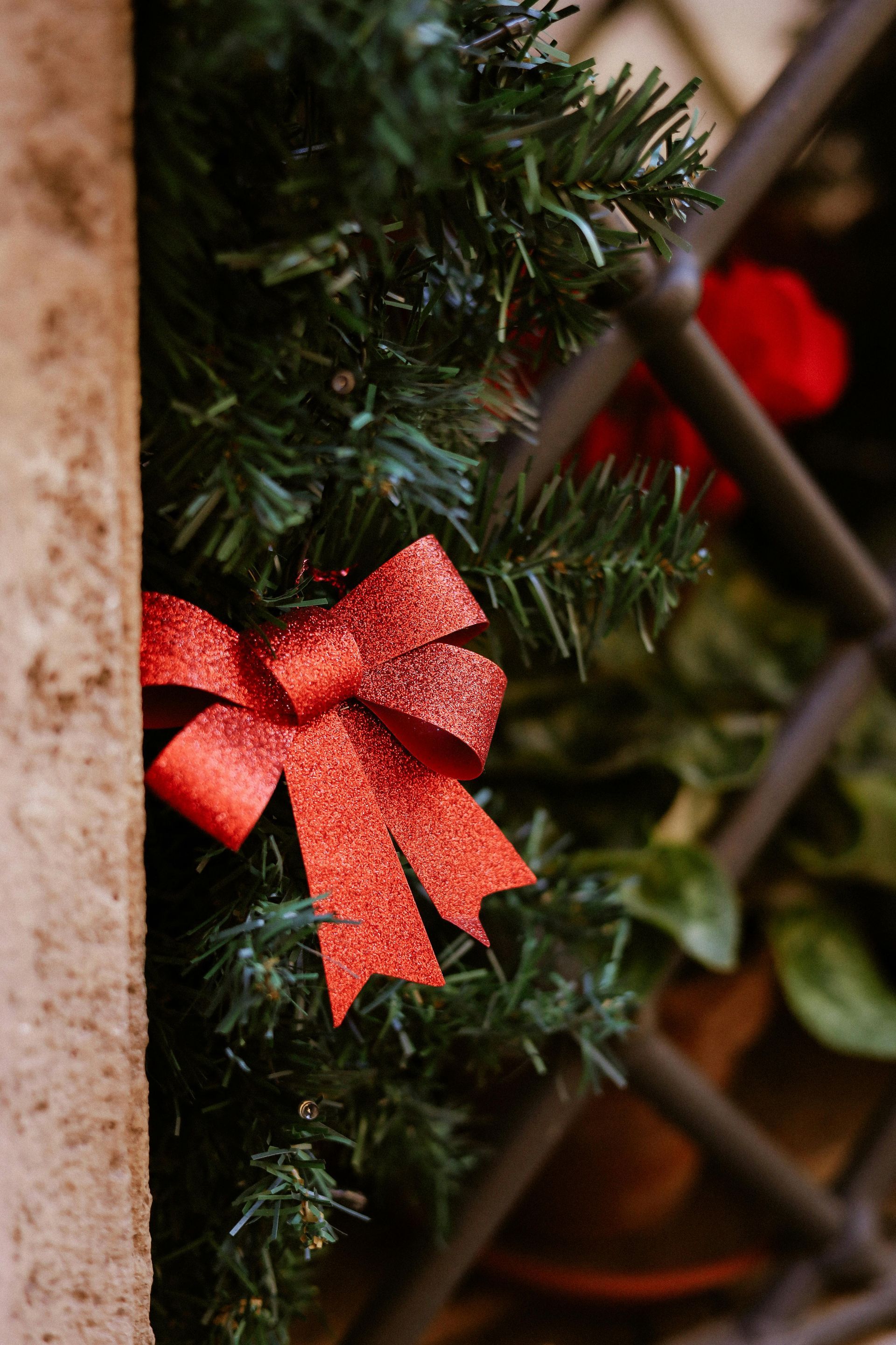 A christmas tree with a red bow on it