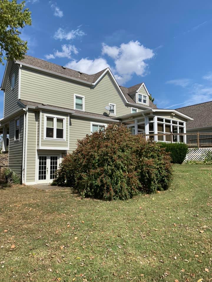 home run improvement team in louisville with siding installation and reroof completed project