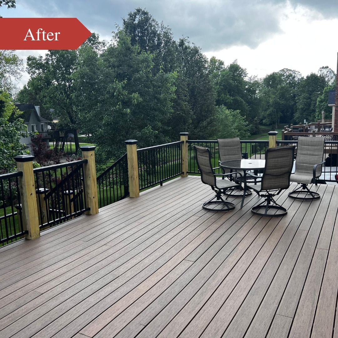 A wooden deck with a table and chairs on it