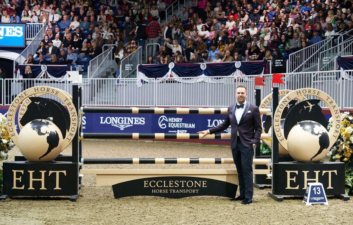 Ecclestone Horse Transport jump at The Royal Agricultural Winter Fair, pictured with Kyle Ecclestone
