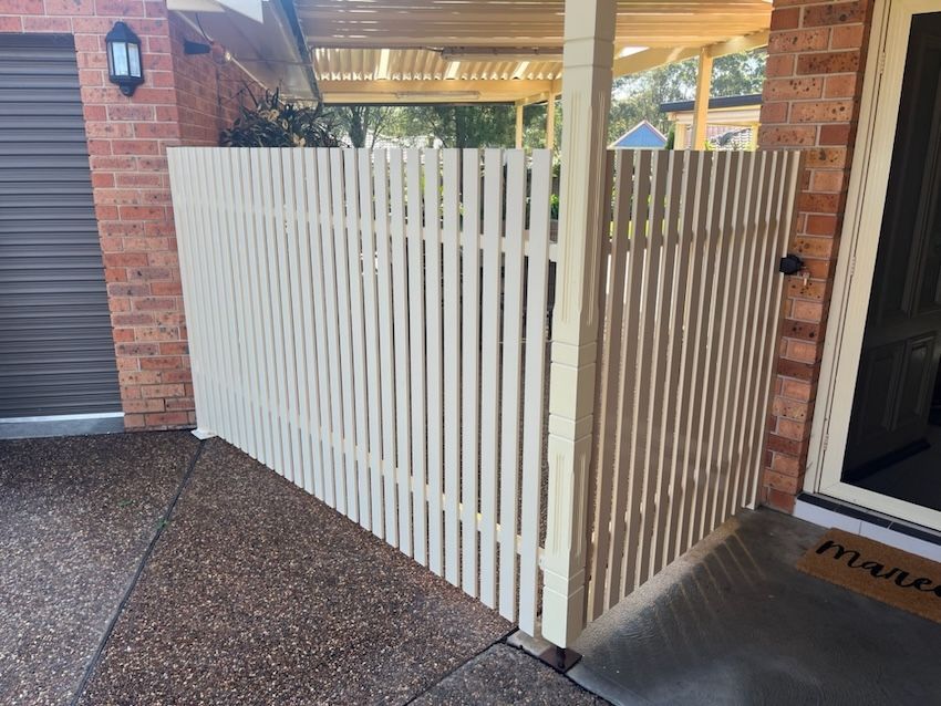 A White Picket Fence with a Lock — Newcastle & MidCoast Privacy Screens & Gates In Maitland, NSW