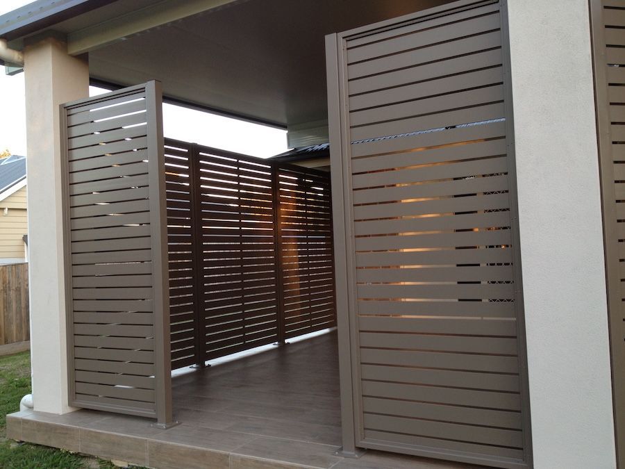 A Brown Privacy Screen with an Entryway — Newcastle & MidCoast Privacy Screens & Gates In Newcastle, NSW