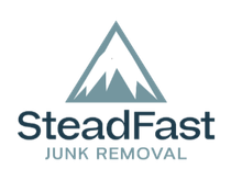 A logo for steadfast junk removal with a mountain in the middle