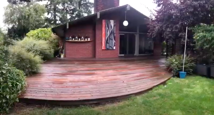 A Portland Mid-Century Modern’s Lowrider Radius Wave Deck by Creative Fences & Decks