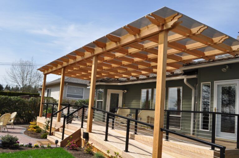 Creative Fences & Decks Built a IPE Deck with Cedar Pergola and Stainless Steel Rails