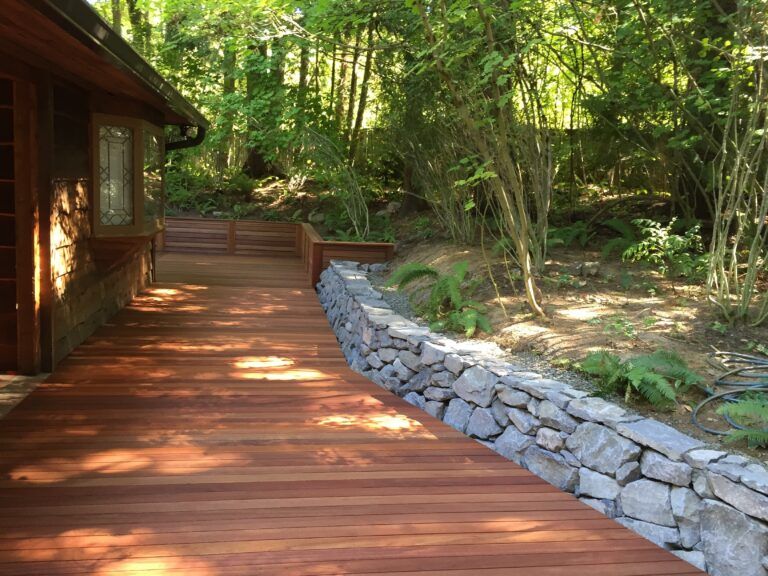 NW Portland Deck with Basalt Retaining Wall Built by Creative fences & Decks