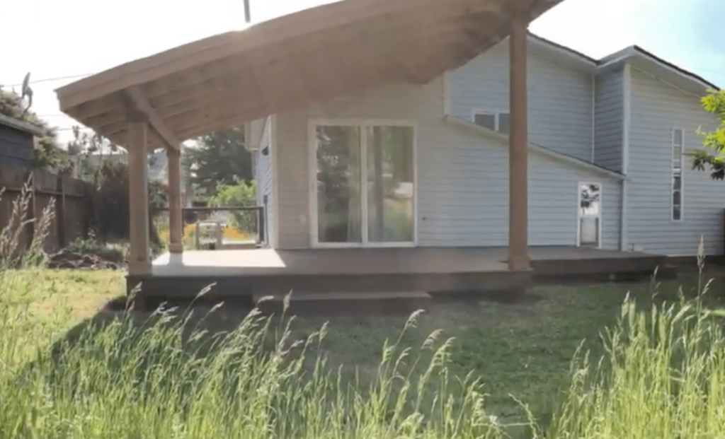 Tiny Deck Gains Size and Modern Appeal with Corrugated Patio Cover