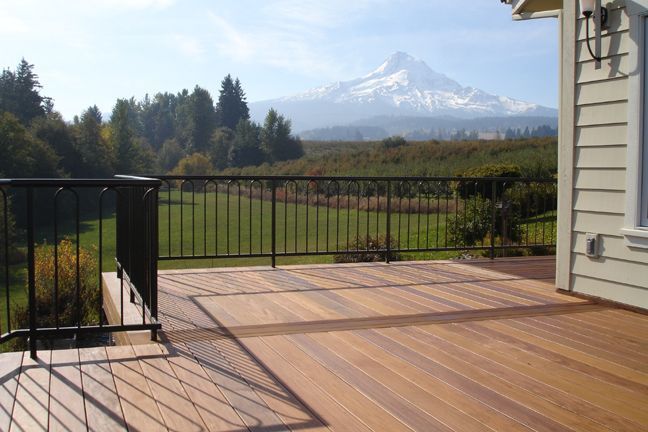 Trex Deck overlooking Mt. Hood with black aluminum railing built by Creative Fences and Deck from West Linn Oregon