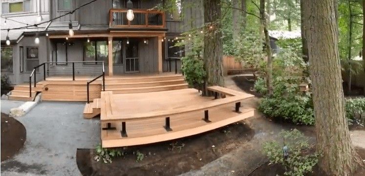 Two-Level Hardwood Deck with Cable Railing and Wrap-Around Bench in Portland, OR