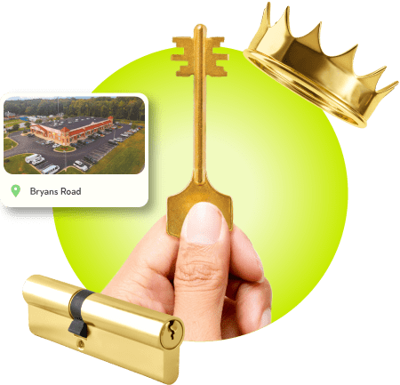 A Locksmith Technician's Hand Holding A Gold Master Key Near A Gold Crown, A Golden Cylinder Lock, And An Image Of Bryans Road City In Charles County.