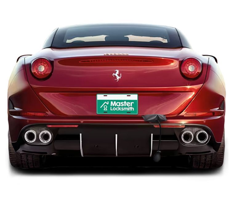 Back View Of A Ferrari Showcasing A 'Master Locksmith' Branded License Plate.