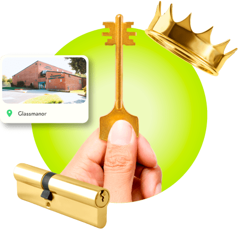 A Locksmith's Hand Holding A Gold Master Key Near A Gold Crown, A Golden Cylinder Lock, And An Image Of Glassmanor In Prince George's County.