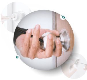 A Close-Up Of A Locksmith Hand Unlocking A Door Knob.