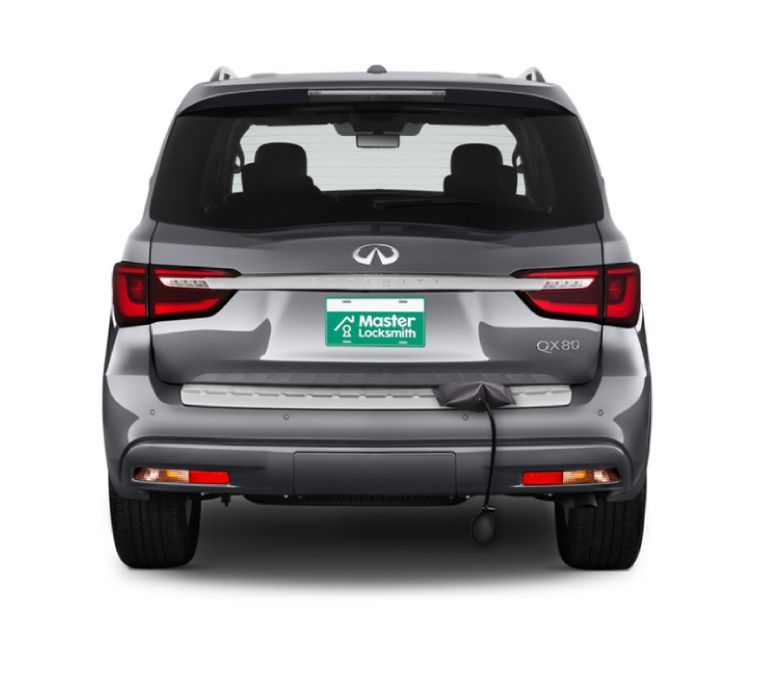 Back View Of An Infiniti Showcasing A 'Master Locksmith' Branded License Plate.