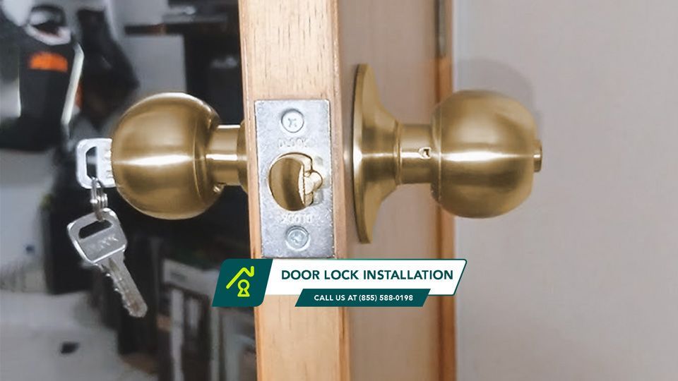 Interior Door Of A House With A New Gold-colored Doorknob Lock And Installed Keys.