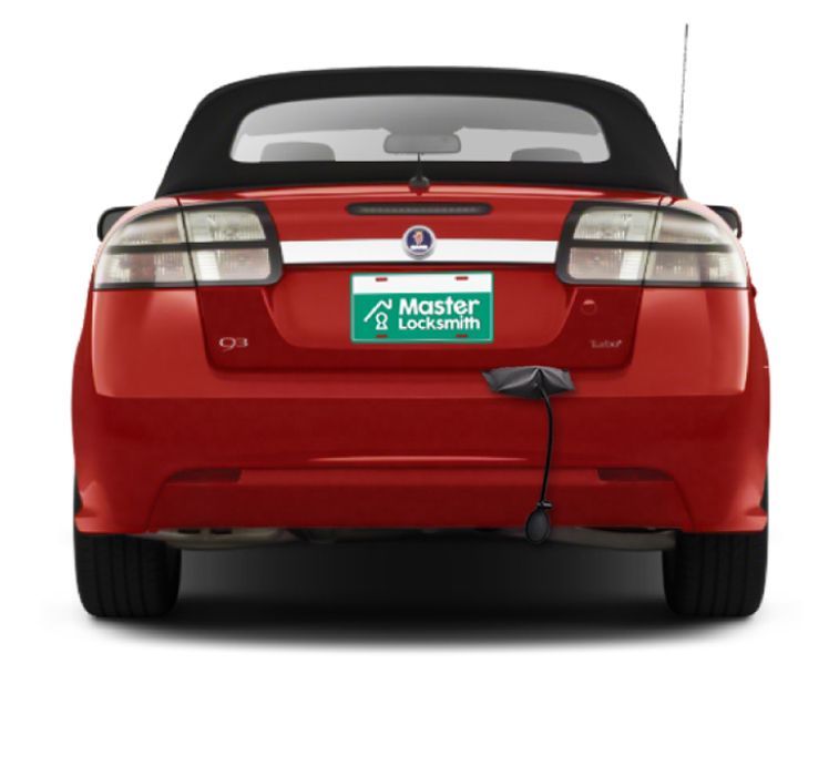 Back View Of A Saab Showcasing A 'Master Locksmith' Branded License Plate.