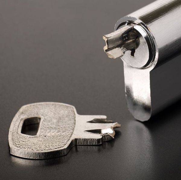 A Lock Cylinder Removed With A Broken Key Still Inside It.