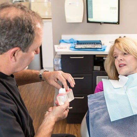 Dentist with His Patient – Mt. Pleasant, SC – Smiles by Hogan