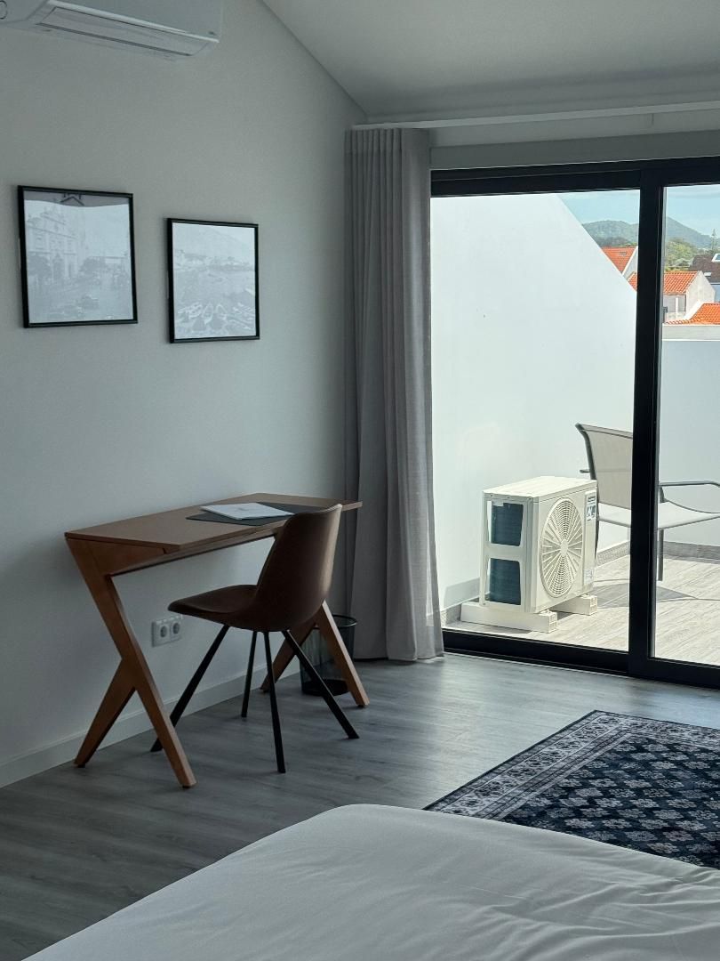 Desk and furnished balcony