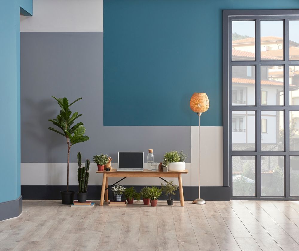 There is a Desk With a Laptop on It in the Middle of the Room — Cairns Floors and More In Palm Cove, QLD