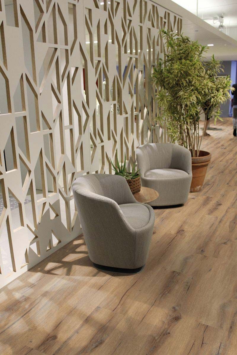 Vinyl Flooring With Two Chairs And Plants — Cairns Floors and More In Cairns QLD