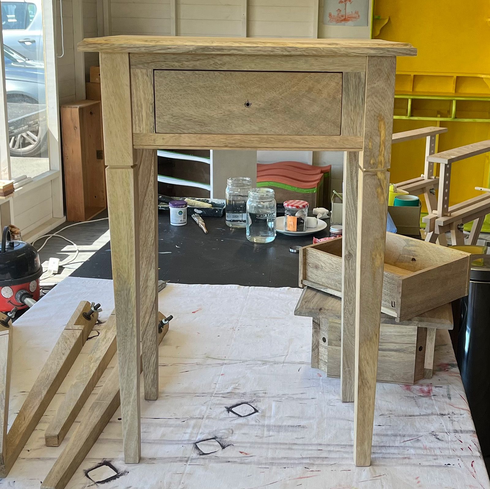 Bare wood bedside tables from Scumble Goosie before being  painted