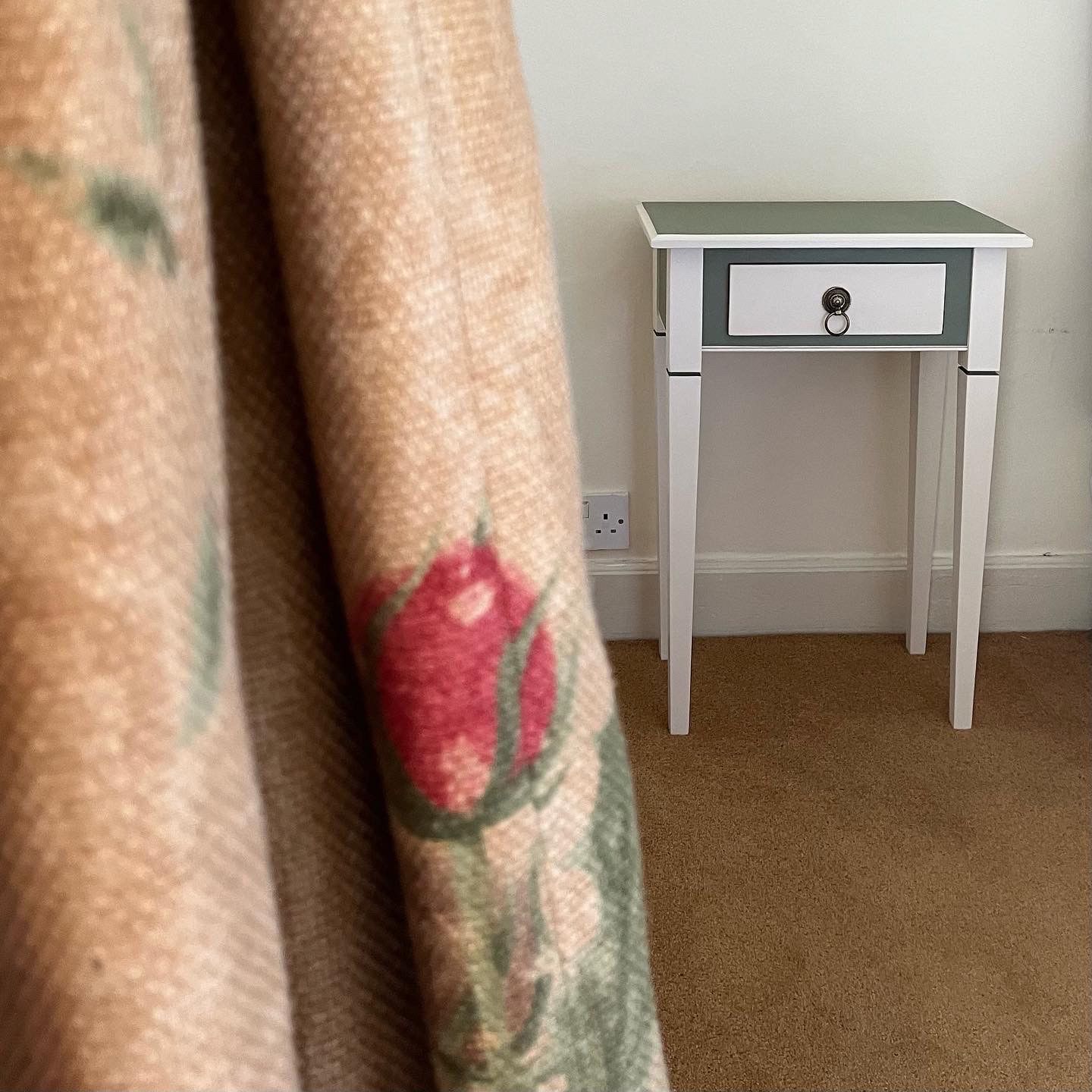 Upcycled bedside tables with colours taken from a curtain