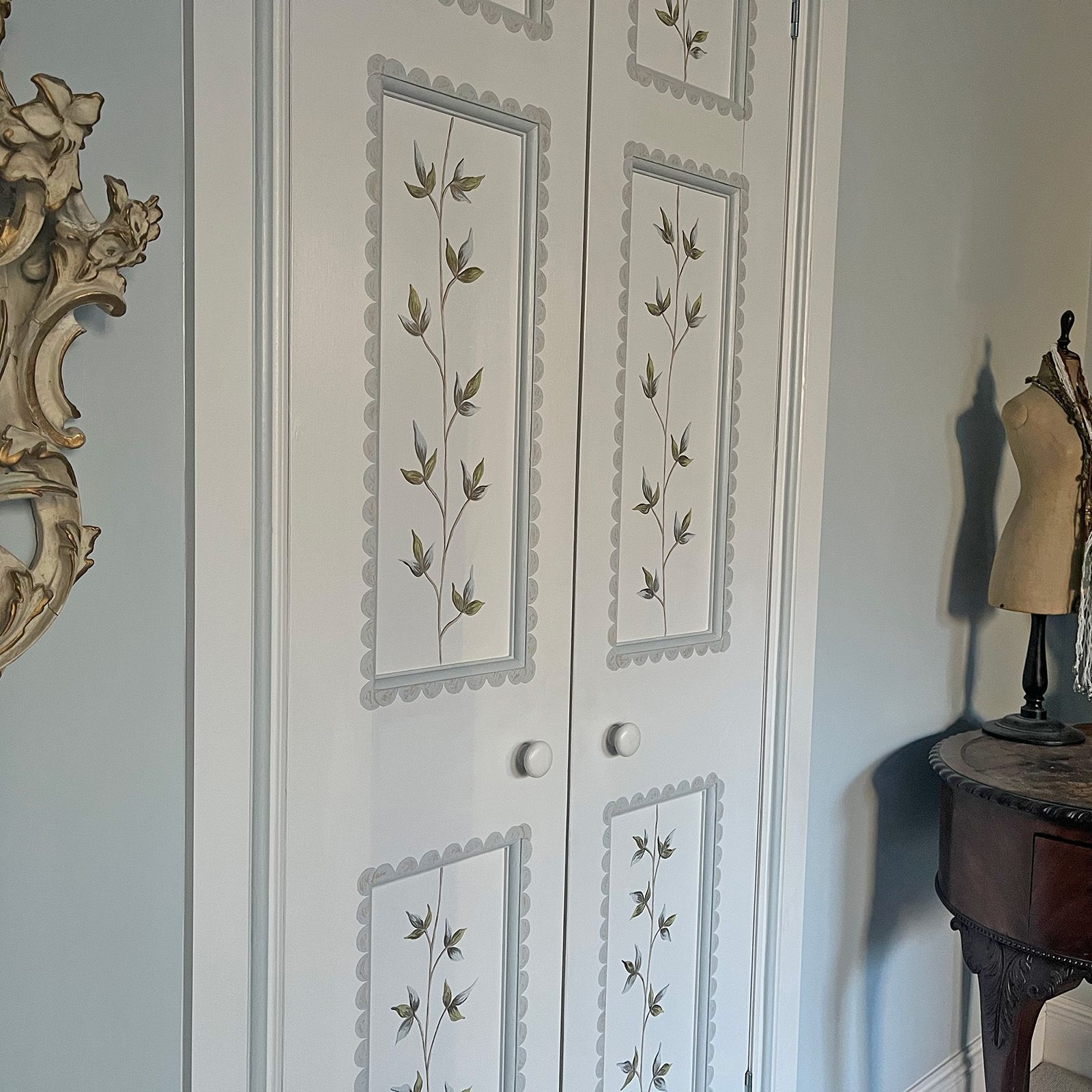 Details on facings and panels of handpainted trellis in a bedroom by Helen Bateman upcycled
