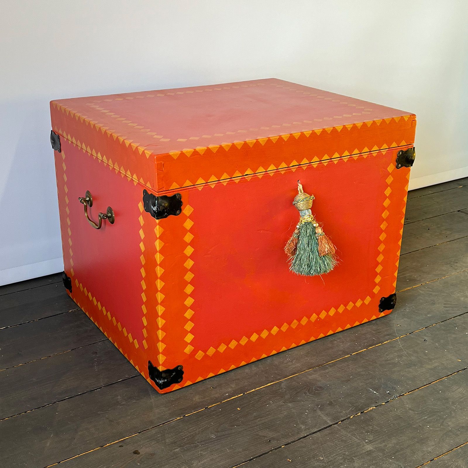 Chest upcycled by Helen Bateman with rose and tangerine panels. Finished with ochre stencils. Pictured in Helen's Edinburgh studio.