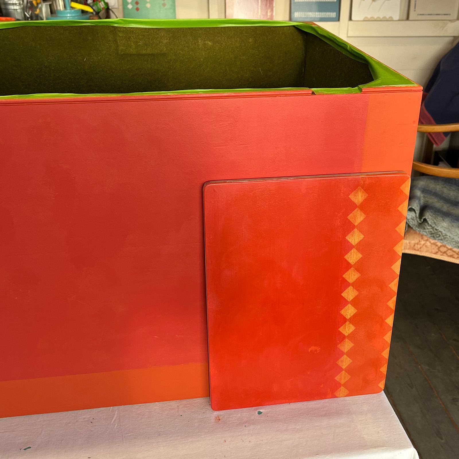 A sample board for the finish of the carnival chest to show the client.