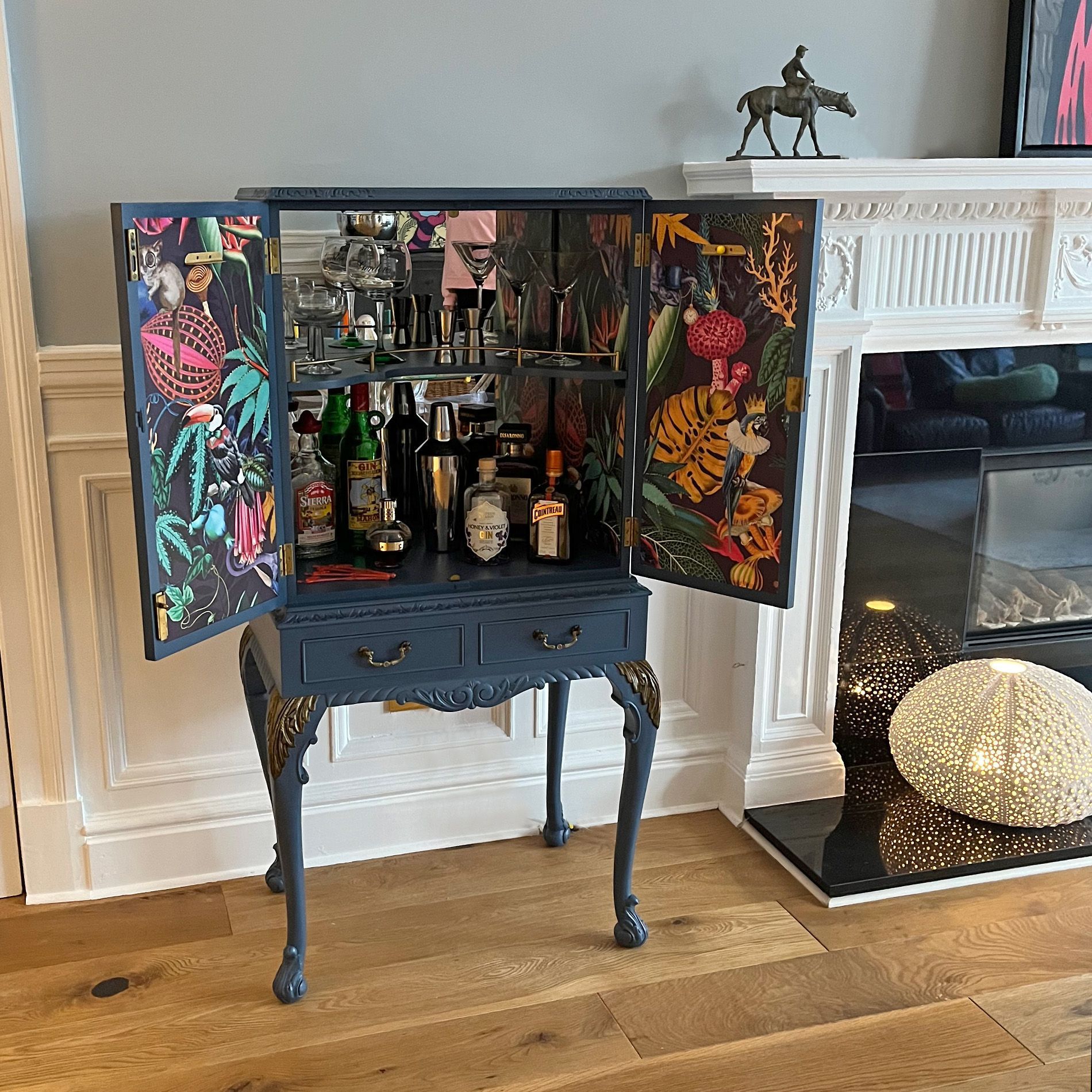 Interior of upcycled blue cocktail cabinet by Helen Bateman