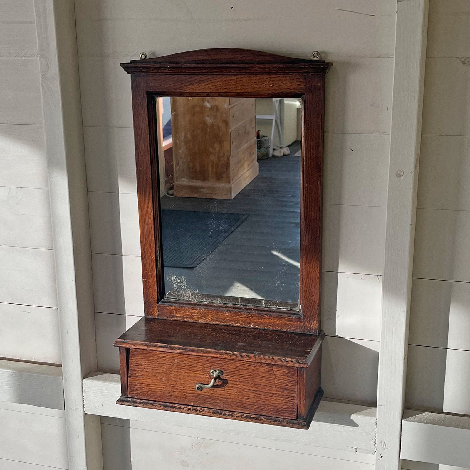 The wall mirror with drawer in it's original brown finish before upcycling.finish.