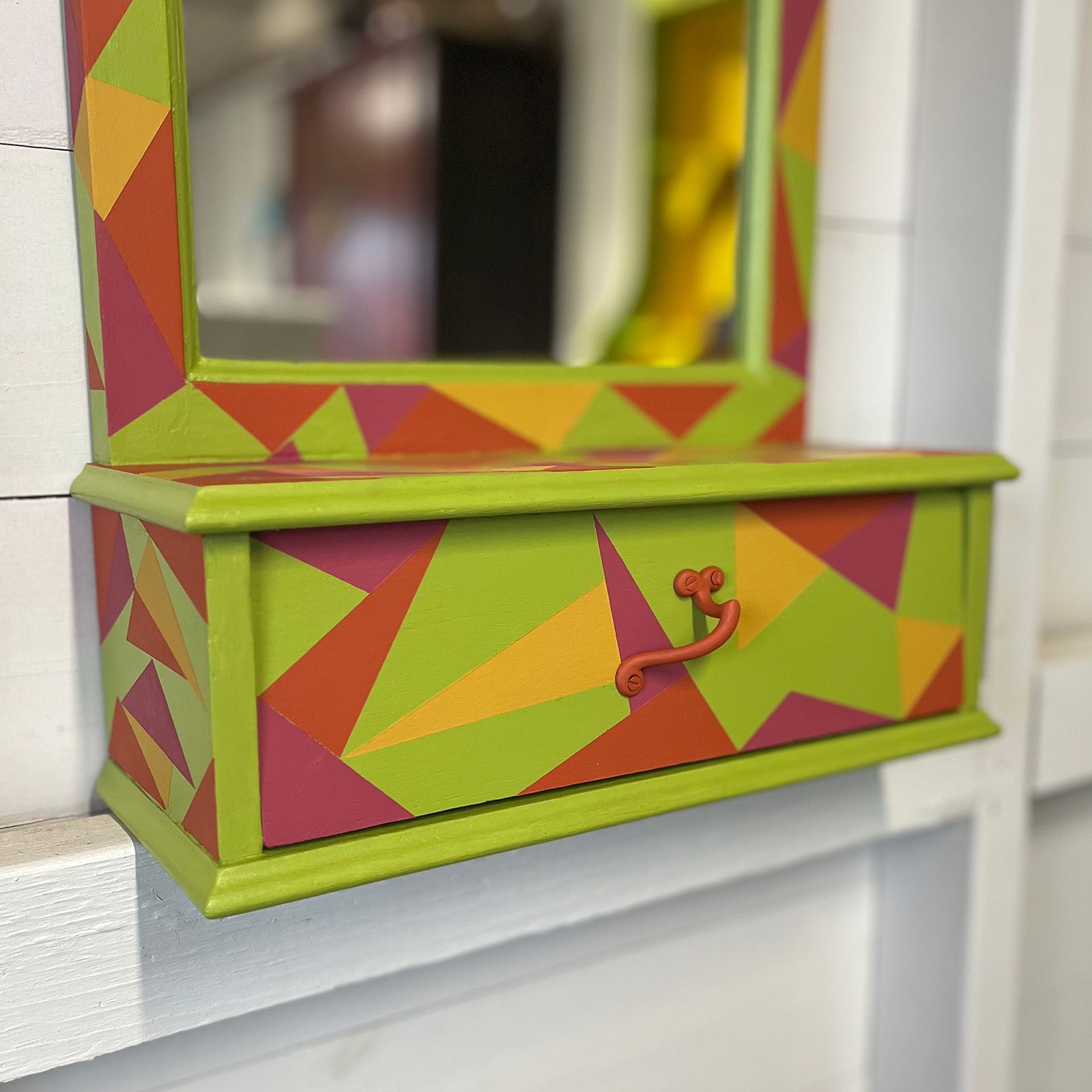 Wall mirror drawer, upcycled with paint in carnival colours.