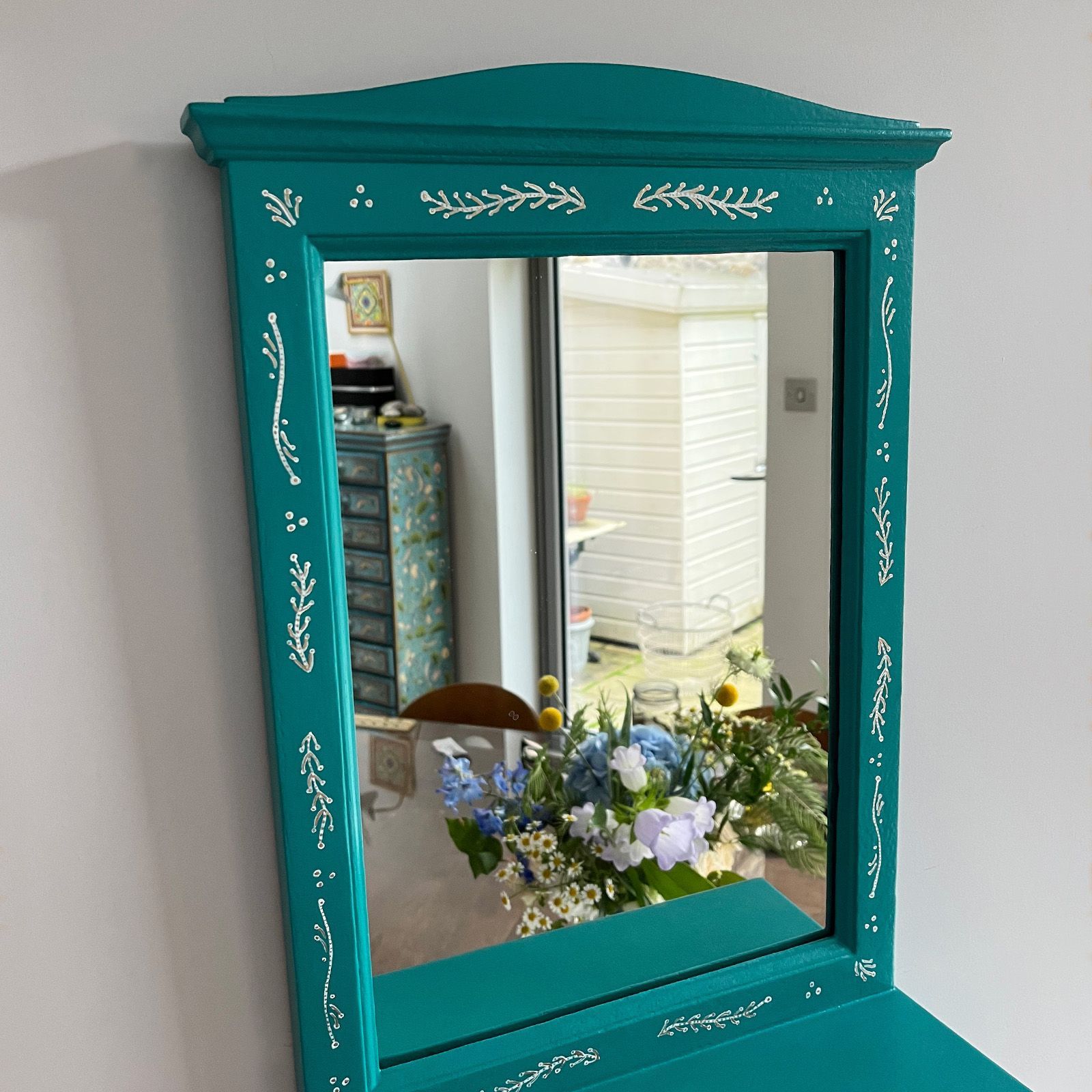 Wall mirror with drawer decoration