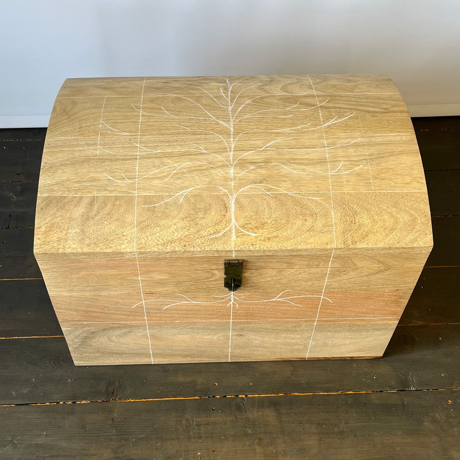 Chalk sketch of tree of life on mini wedding chest.