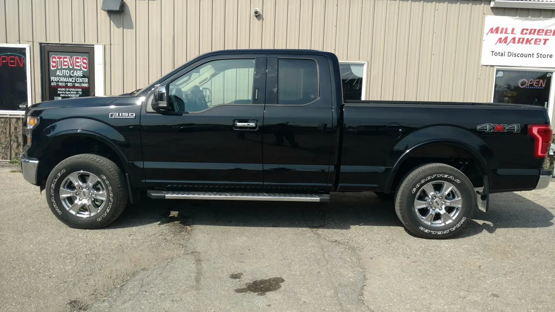 Black Ford F-150 Pickup Truck Parked Outside The Shop | Steve's Auto Care, Inc.