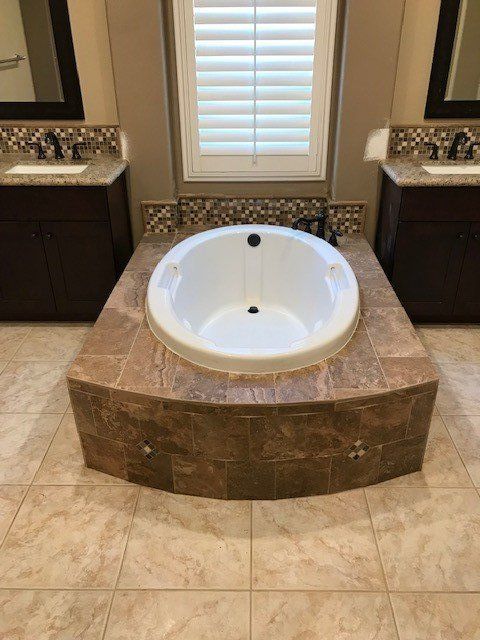 Bathroom Installation — Small Bathroom Tub in Riverside, CA