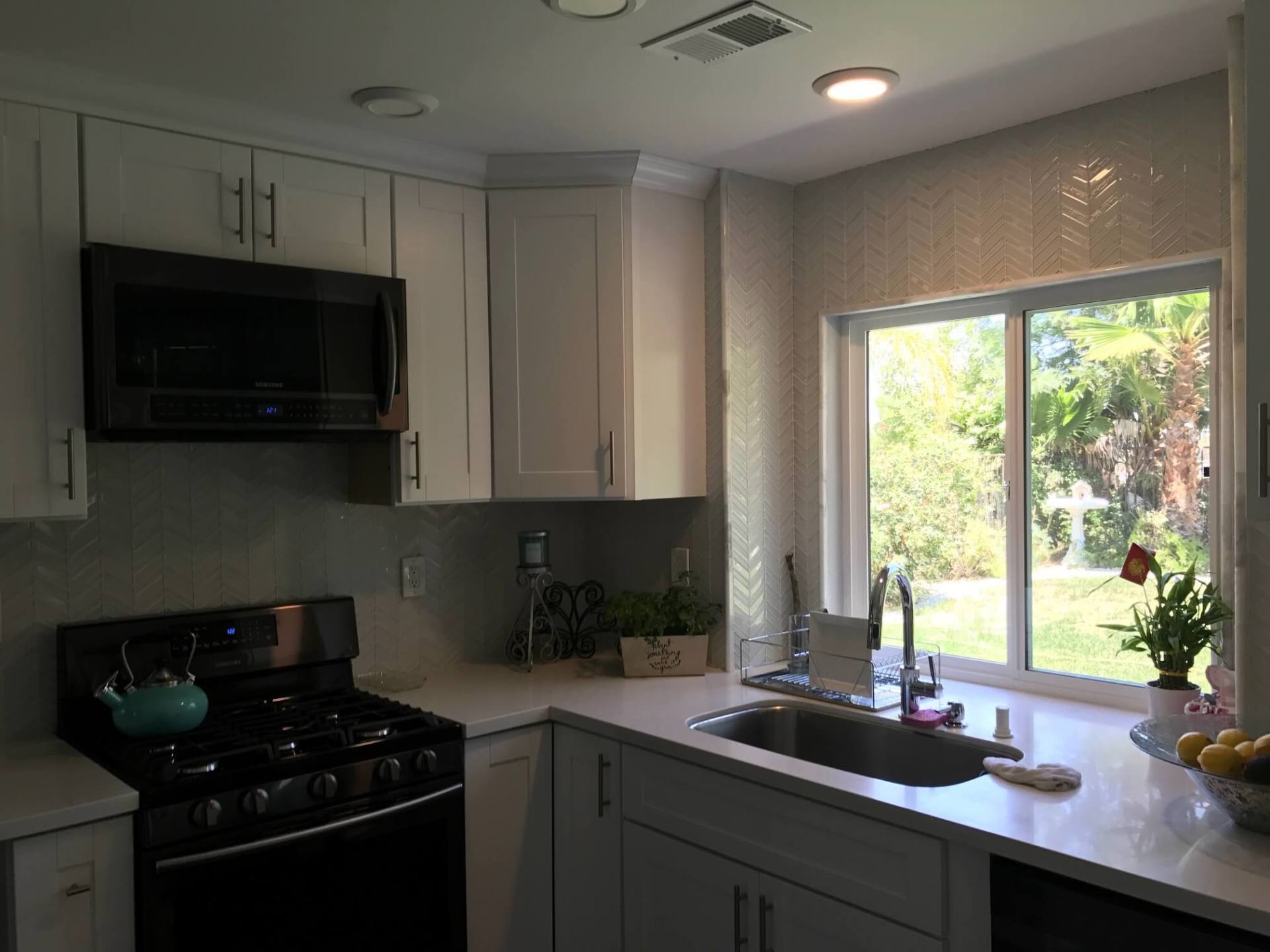 Deem light Kitchen Sink and Gas Stove — Riverside, CA — Vallin Bros Contractors