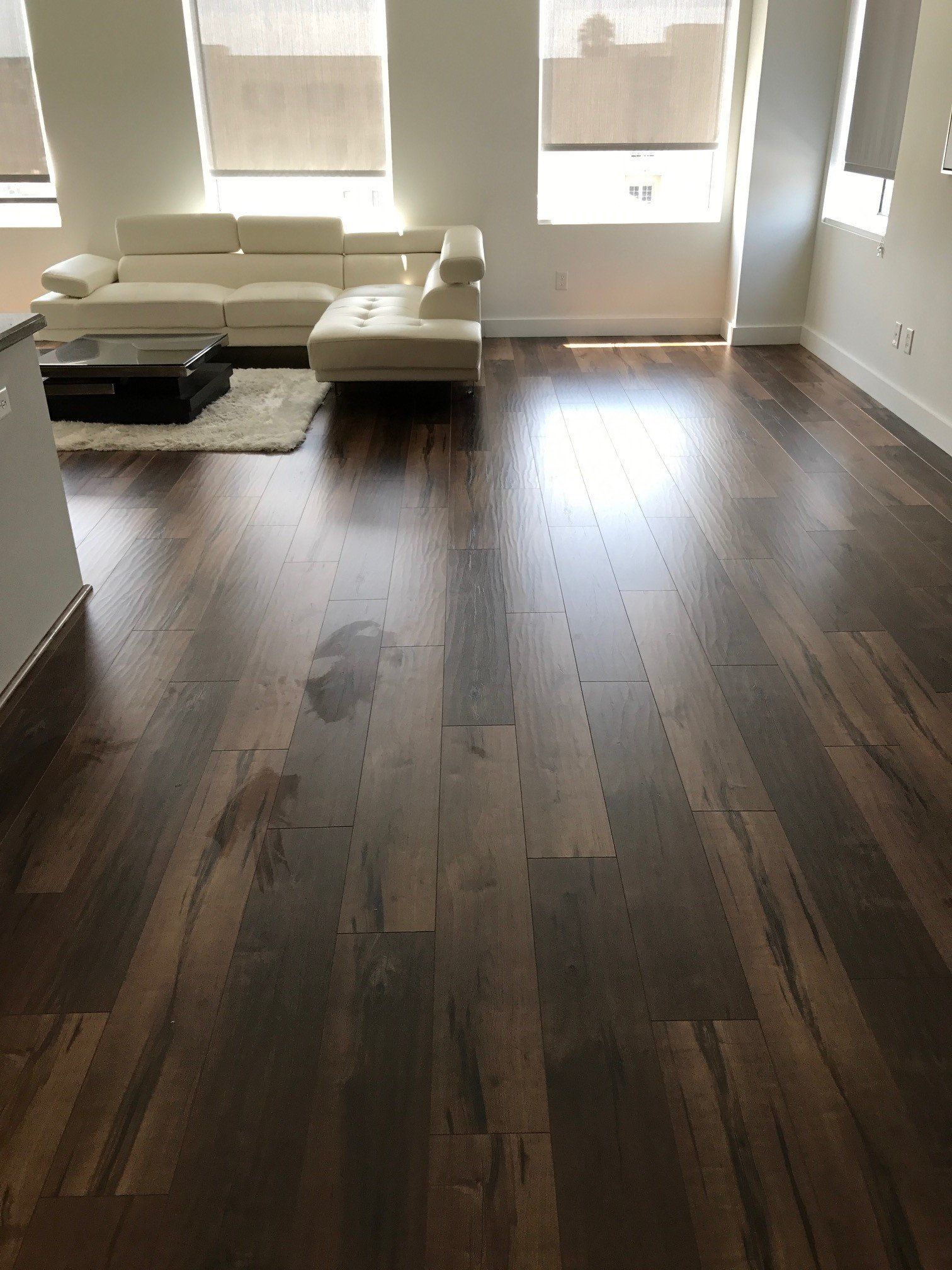 Living Room Floor with Couch and Table — Riverside, CA — Vallin Bros Contractors