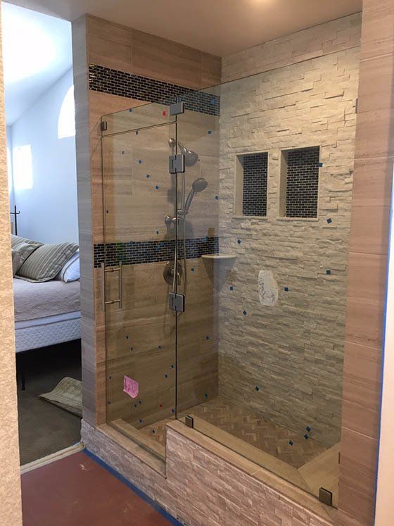 New Glass Bathroom Door ─ Riverside, CA ─ Vallin Bros Contractor