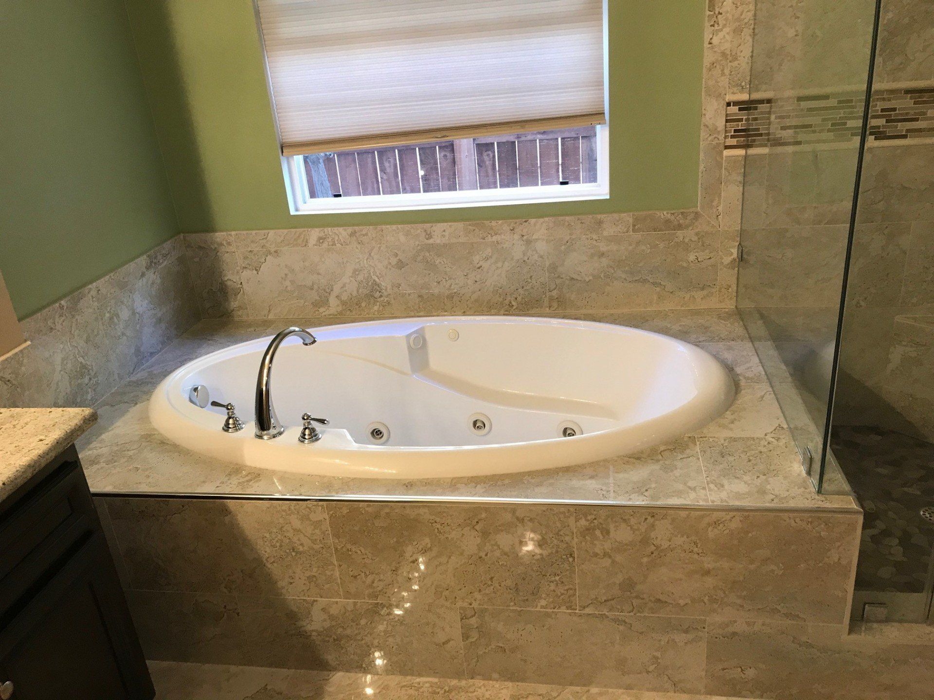 White Bath Tub Beside the Window — Riverside, CA — Vallin Bros Contractor