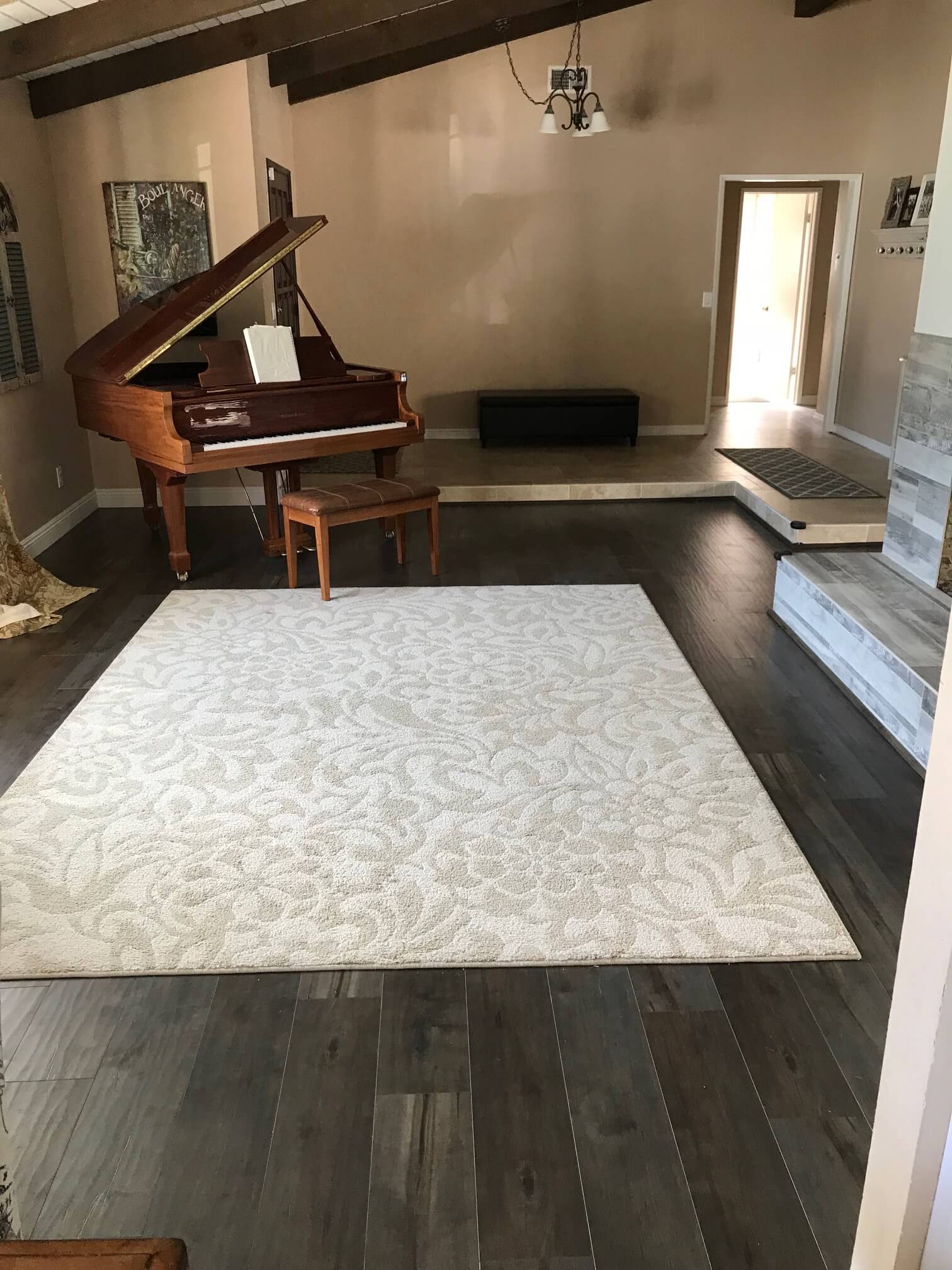 Dark Wooden Flooring with Carpet and Piano — Riverside, CA — Vallin Bros Contractors
