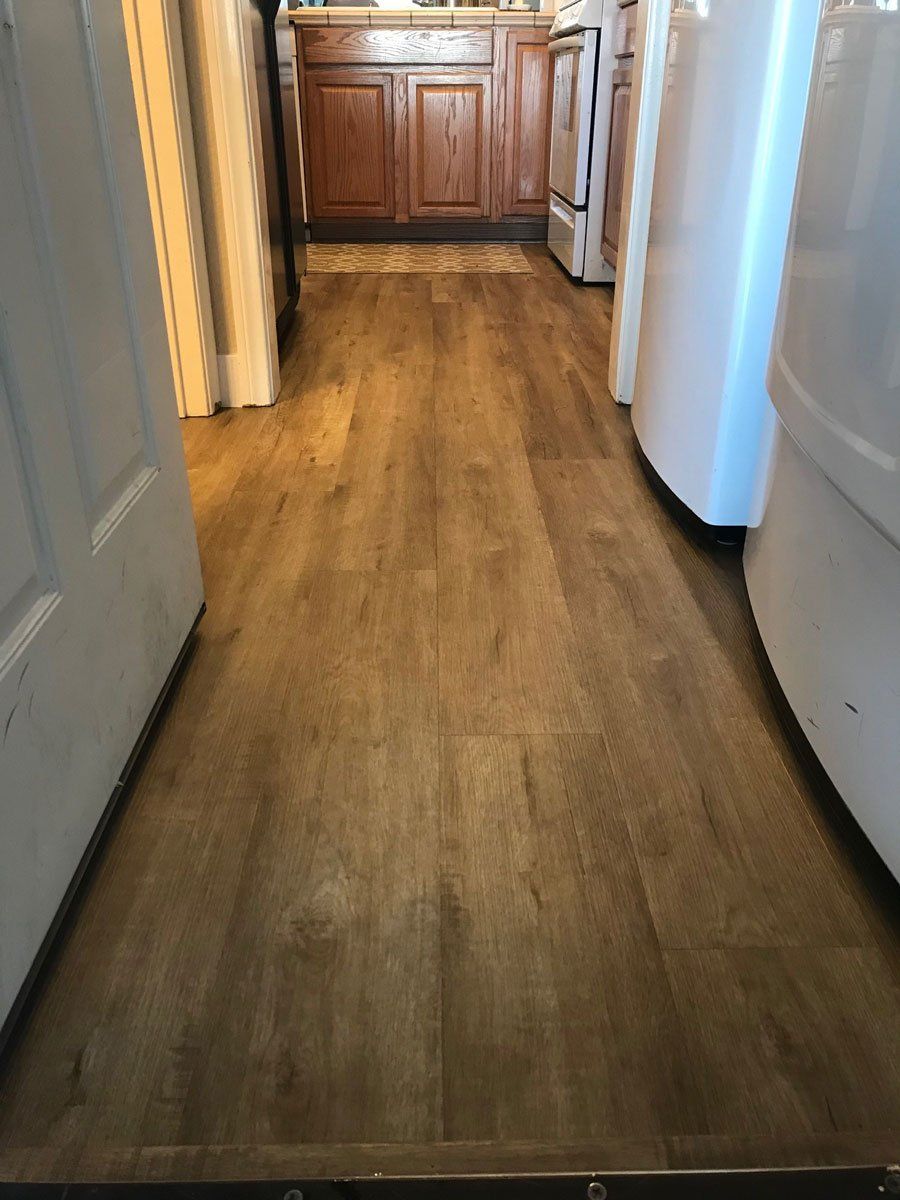 Hallway with New Vinyl Floor — Riverside, CA — Vallin Bros Contractors