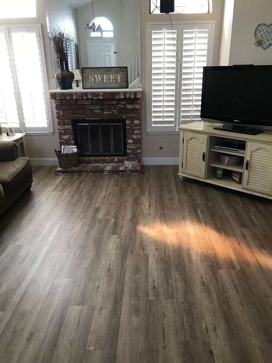 Entertainment Room with New Vinyl Flooring — Riverside, CA — Vallin Bros Contractors